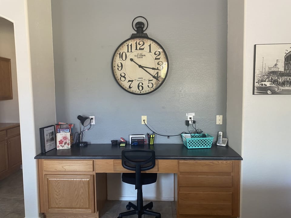 Work area - basic office supplies and chair 