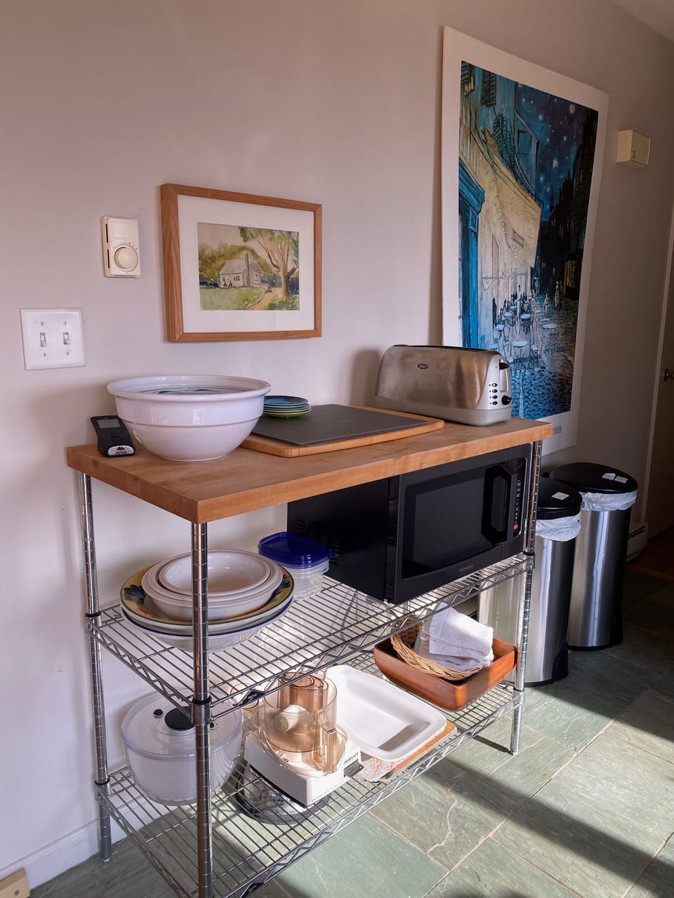 kiitchen butcher block rack with toaster, microwave, and food processor