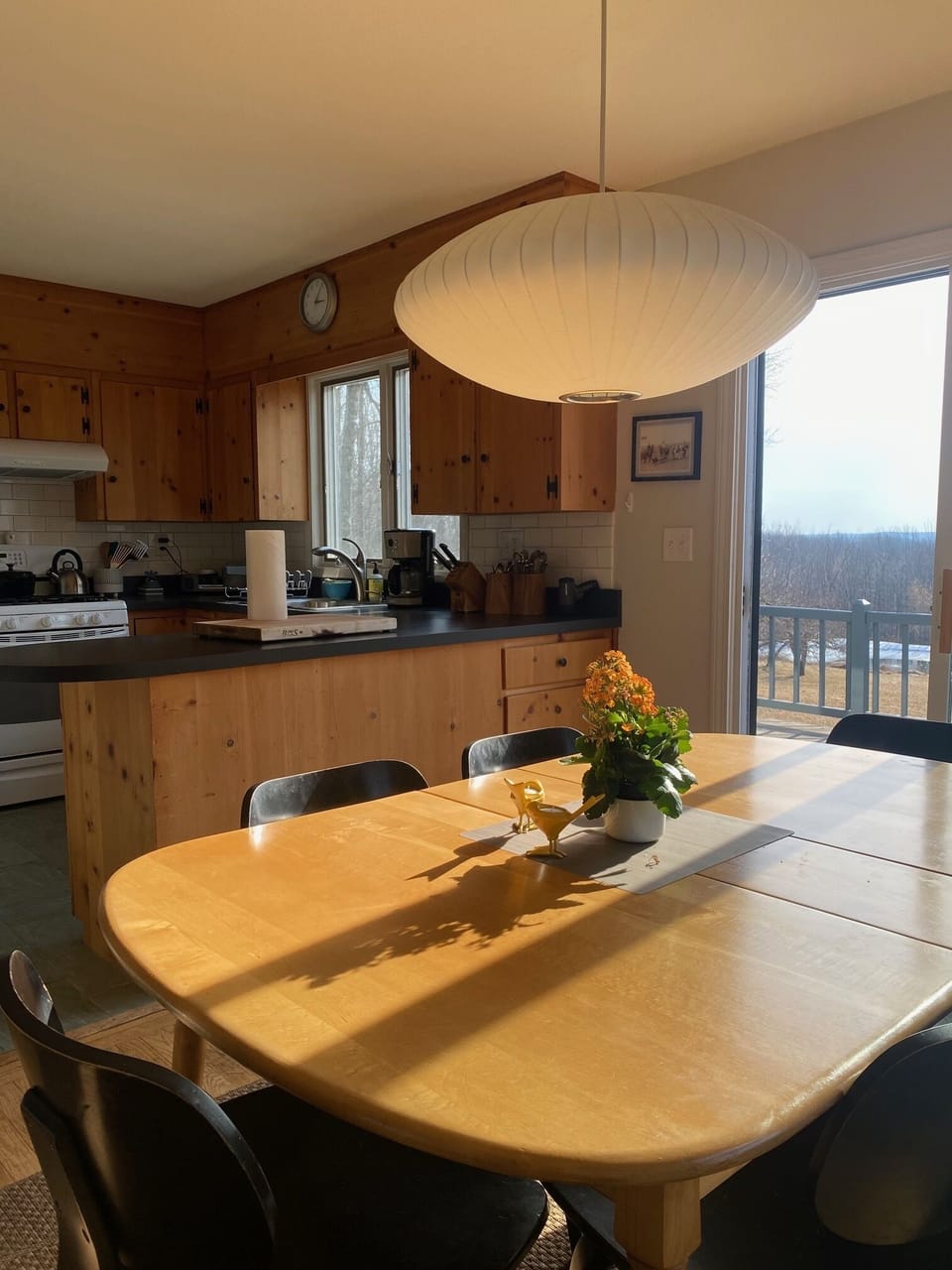 Dining table with view to kitchen