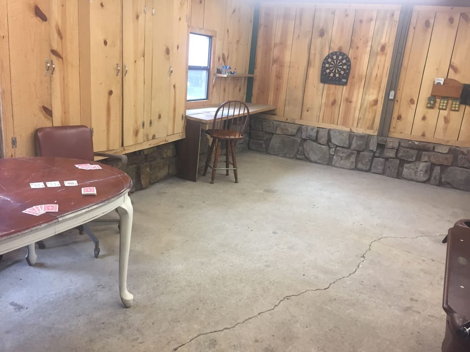Shared Game Room Access: Card/game table and dart board