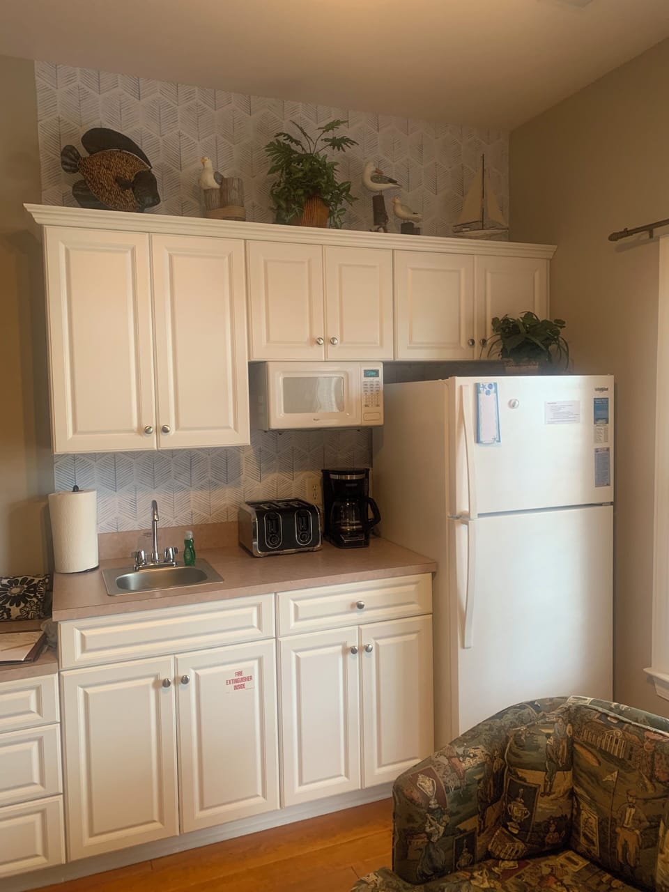 Mini suite kitchenette -  microwave, refrigerator, coffee maker, toaster, sink. 