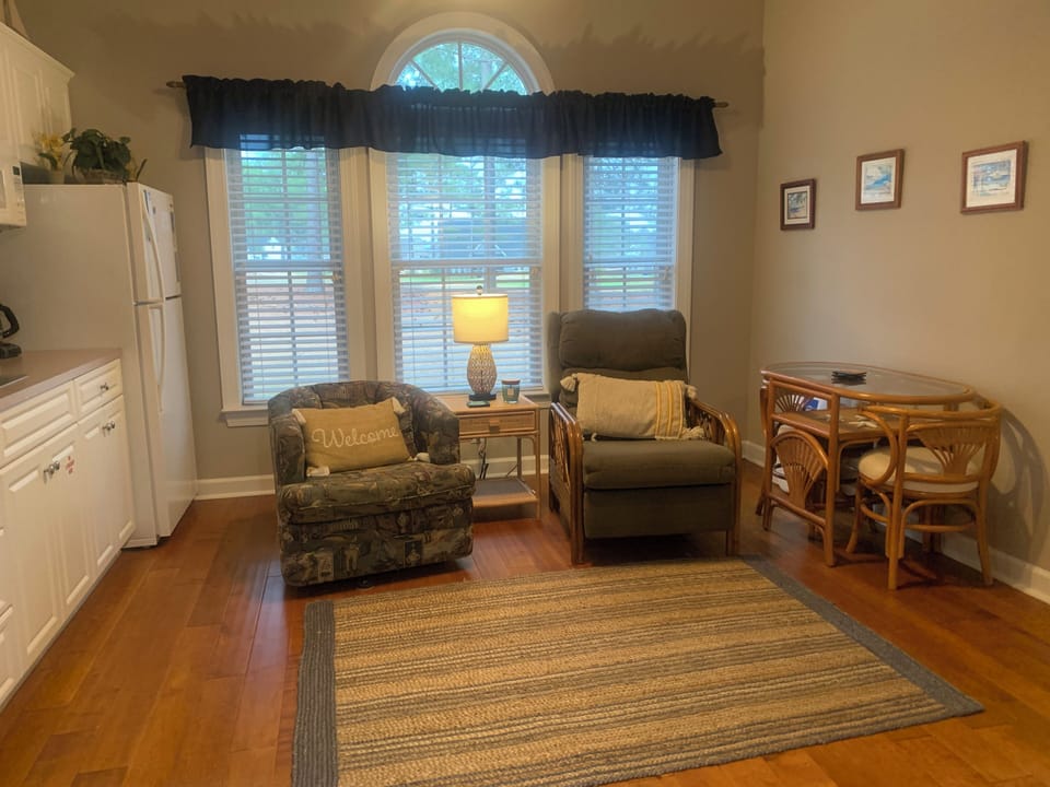 Mini Suite sitting area has reclined and table for 2