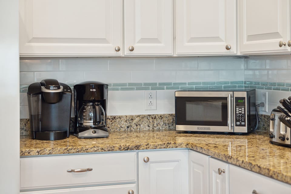 Full kitchen with Keurig and standard coffee maker.