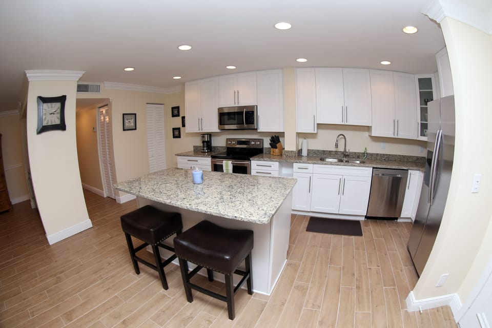 gourmet kitchen with lots of cabinets