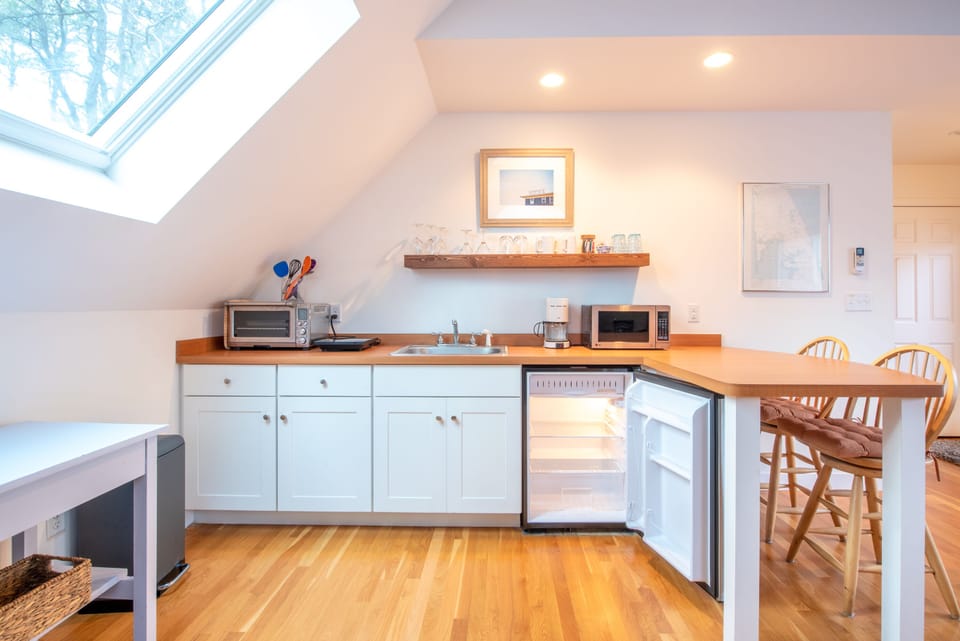 Large under counter refrigerator with small freezer