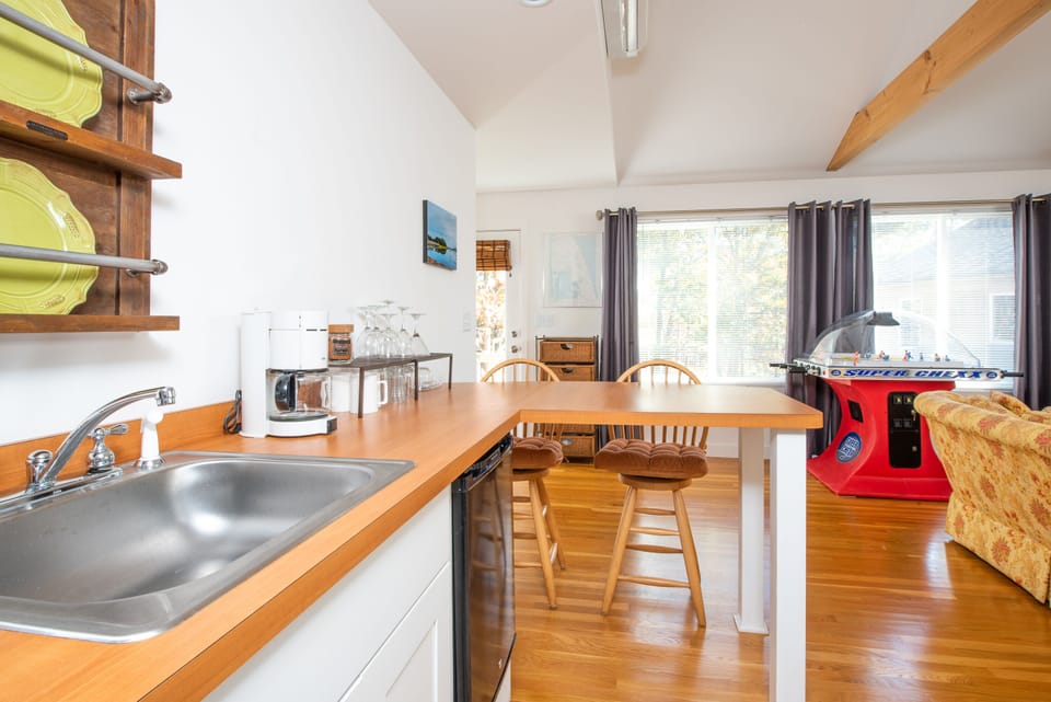 kitchen stocked with dishes, utensils, pots, and all you need for grilling.