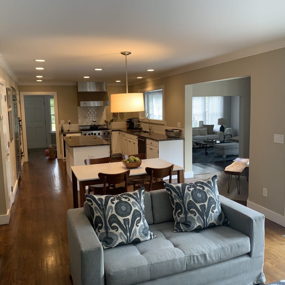 Kitchen with view of the living room in the background 