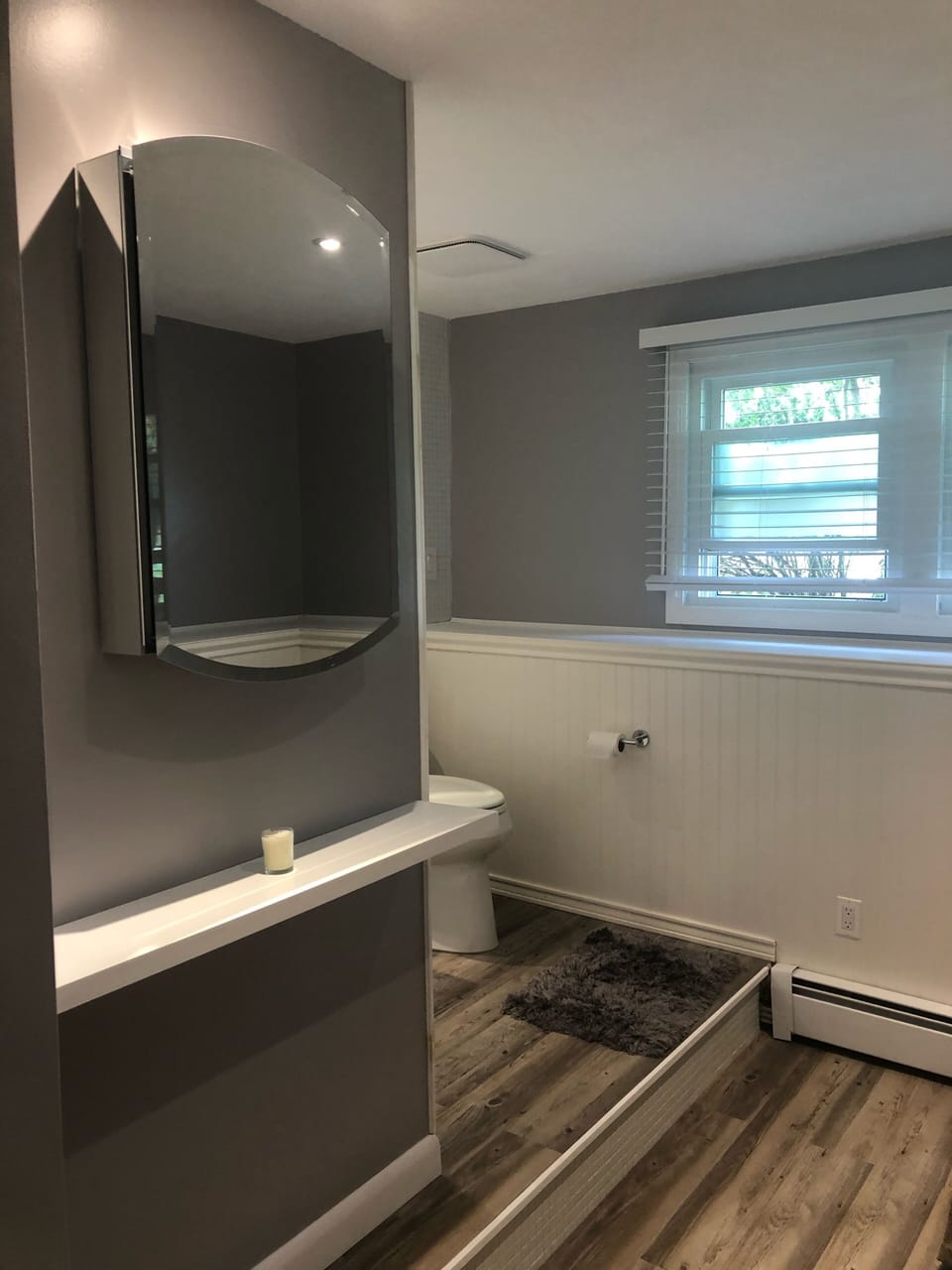 Entry to lower level third full bath 