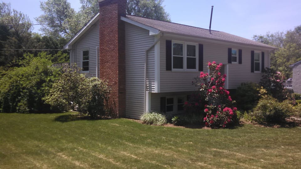 Front & side yard with roses that bloom until late fall

