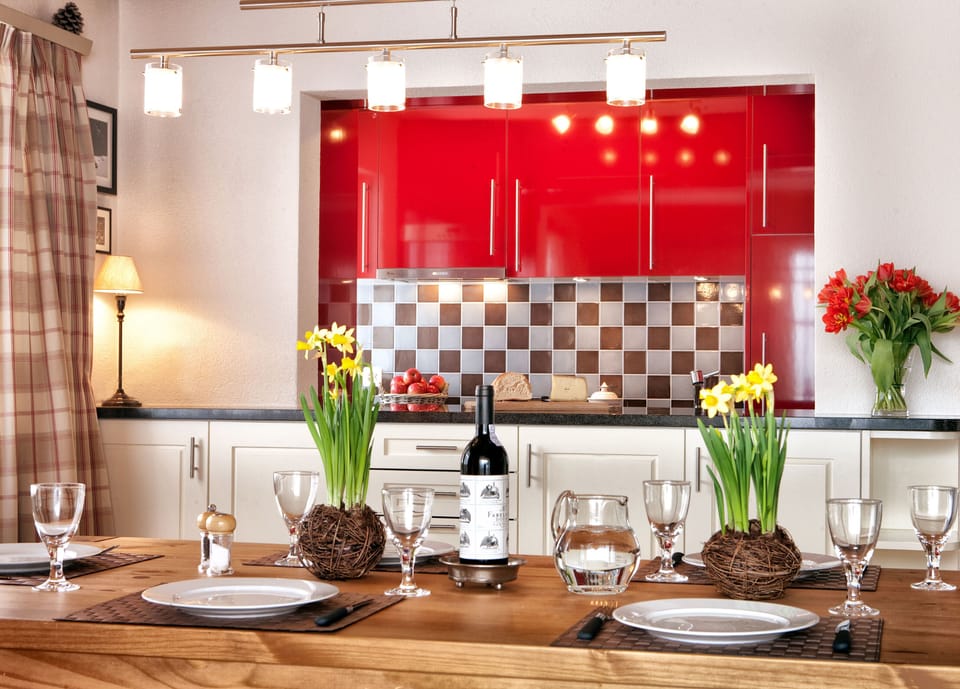 Dinning area looking through to upper floor kitchen.
