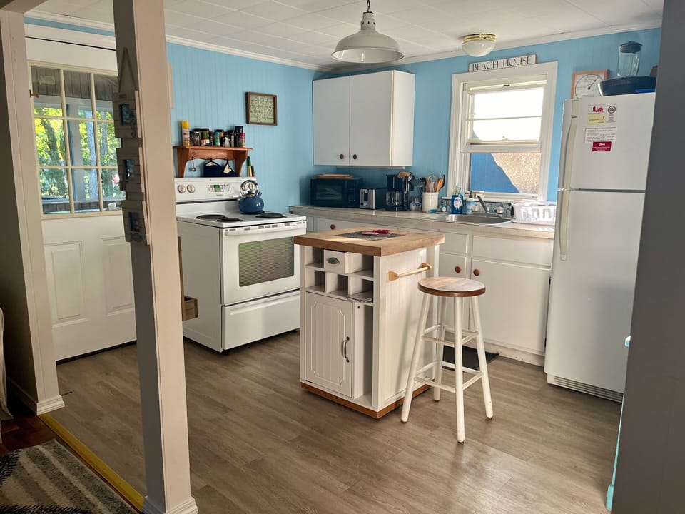 Fully equipped kitchen includes coffee maker, microwave, blender, etc.