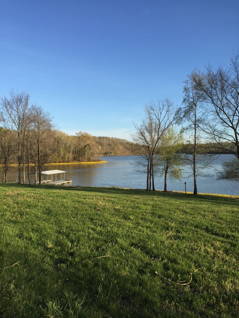 Very gentle slope. 500 feet of shoreline Premier lot!!