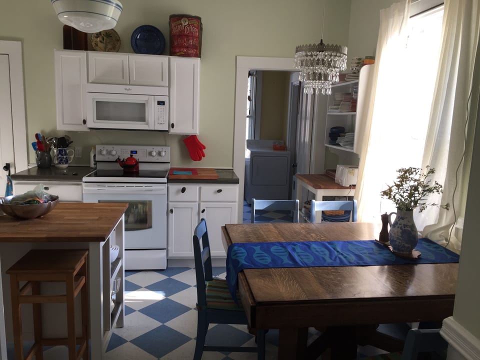 Plenty of room at the kitchen island or table to hang out