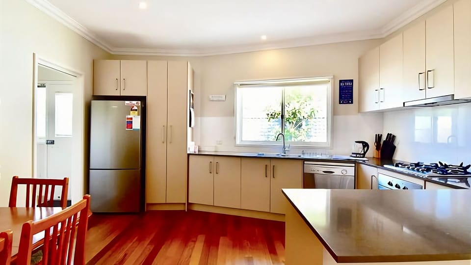 Light filled, fully equipped kitchen.