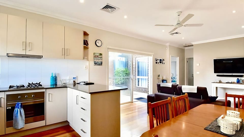 Fully equipped open plan kitchen, dining and living room.