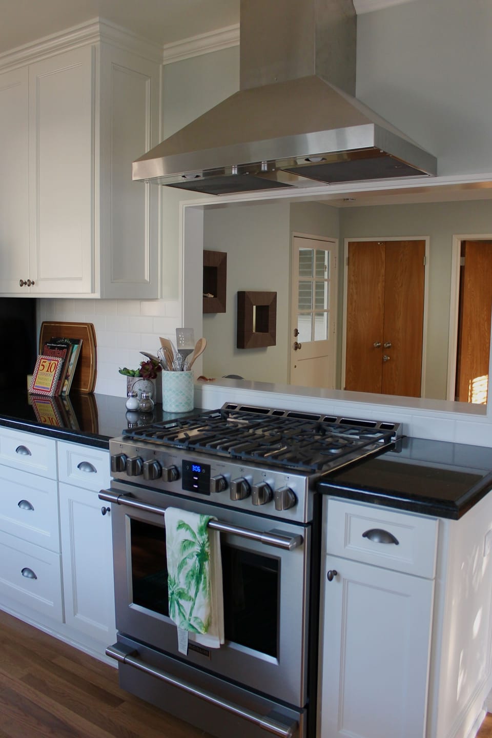 Kitchen with new gas range open to living area