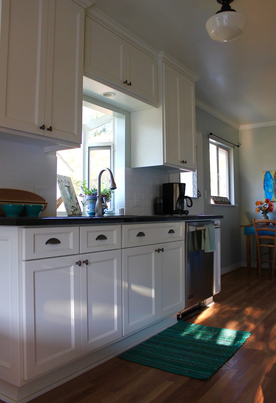 Granite countertops and farm-style sink