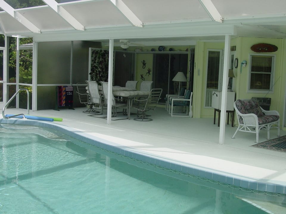 pool and lanai to master bedroom and dining room