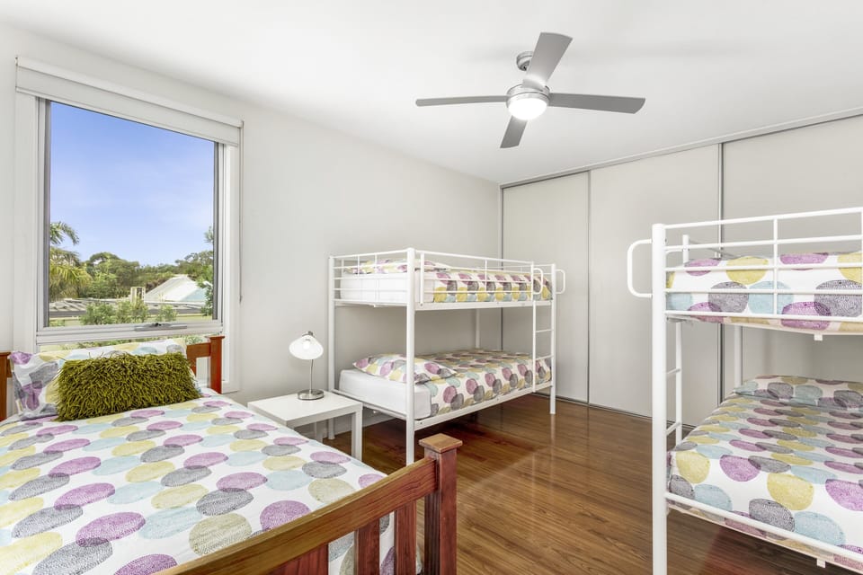 Upstairs singles bedroom for 5+