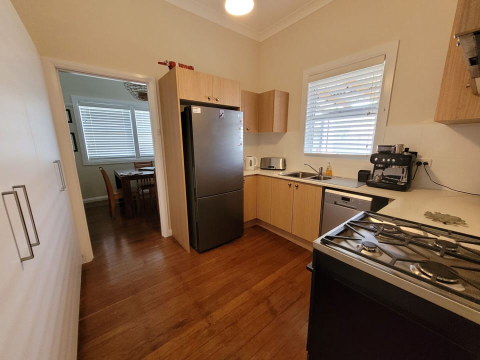 Well equipped kitchen with gas stove top, plenty of utensils and storage. 

