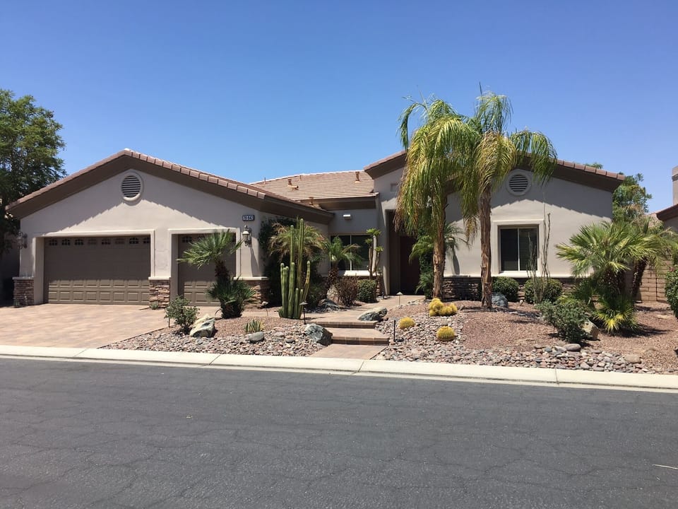 3 Car Garage & Desert Landscape