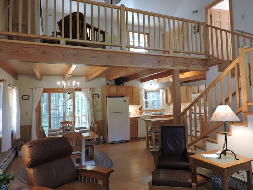 Looking towards the Dining Area and Kitchen.  Loft and Master Bedroom above