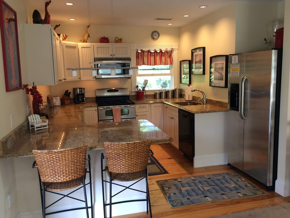 Open kitchen with bar seating