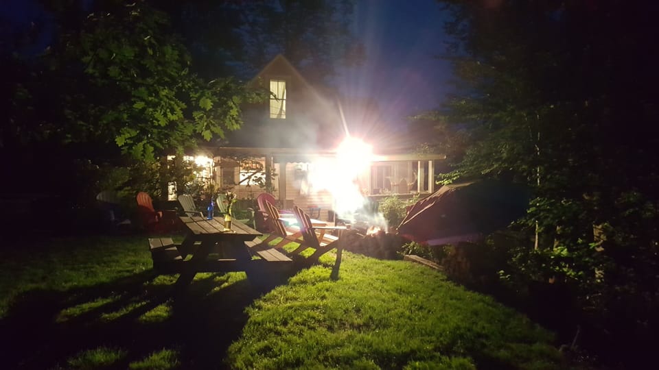 the cottage and yard at night...