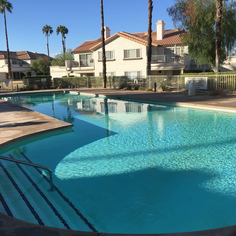 Pool #2 also has a shallow end for kids and an adjacent hot tub.