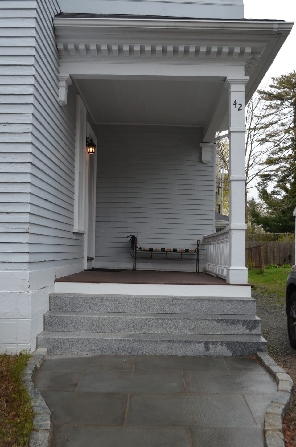A covered porch welcomes you to the house