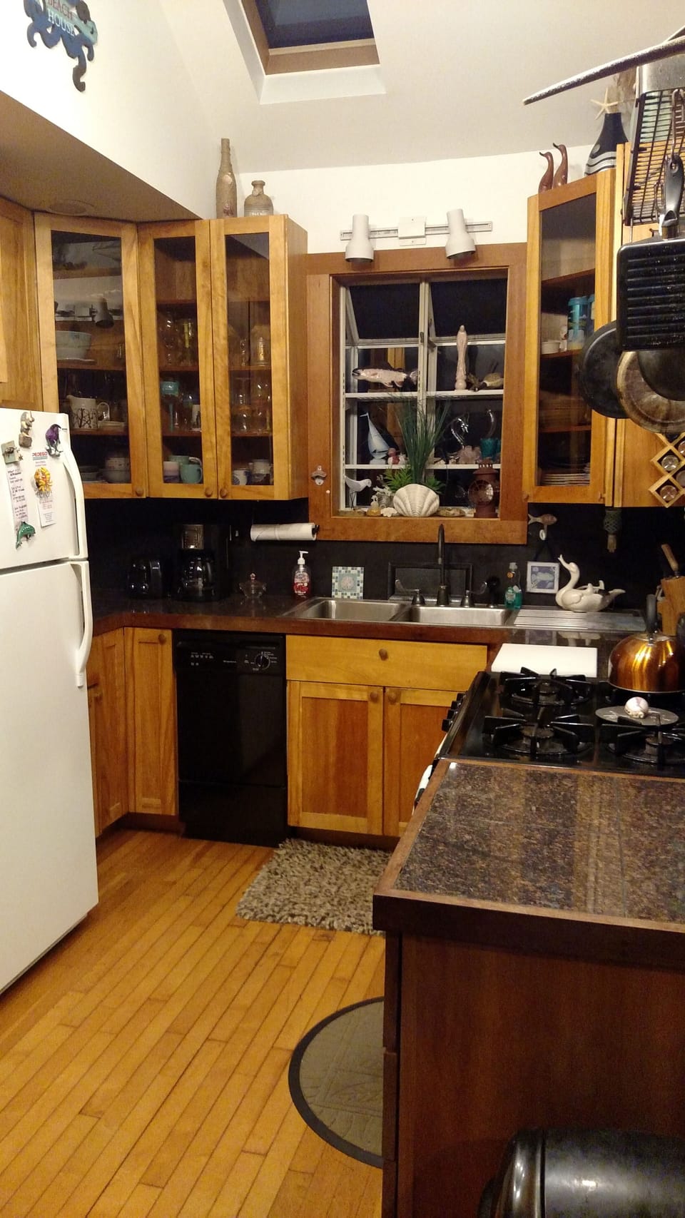 fully stocked kitchen , dishwasher , gas stove 