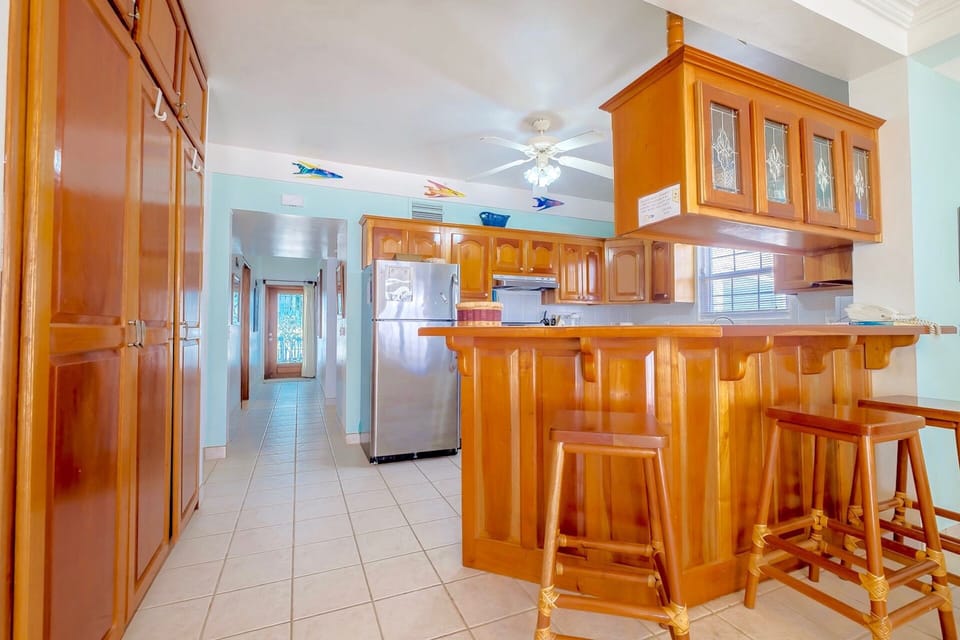 Each condo has a fully equipped kitchen with counter seating