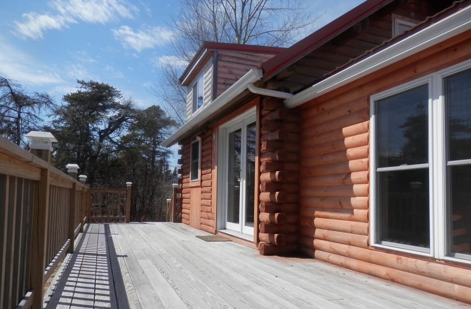 Front of cabin...deck chairs and grill in the summer!