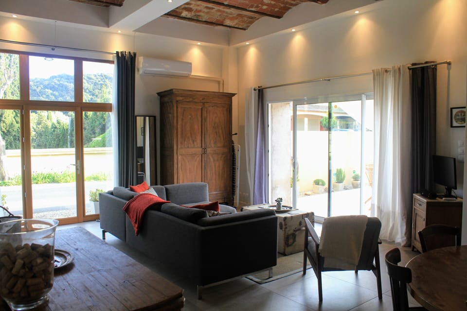 Main living space with large windows, south and west exposure