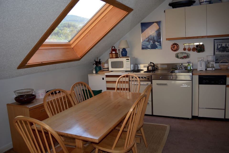 Upper Level Dining Area & Efficiency Kitchen.