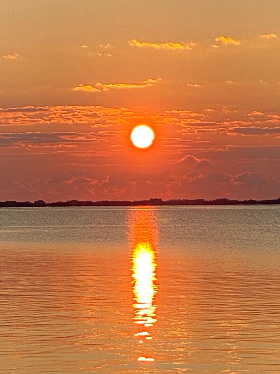 Sunset over the bay from deck