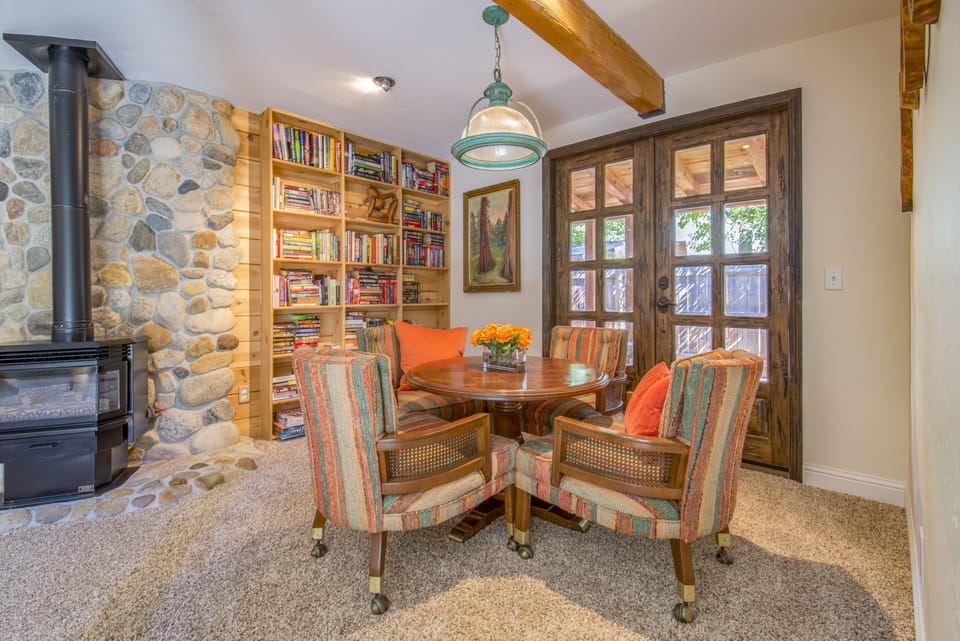 Library and game table with poker chips 