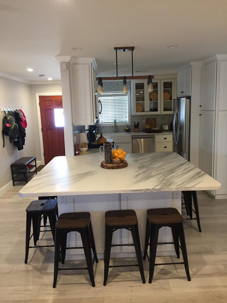 Kitchen w/custom wood cabinetry, Shaker style cabinets, & soft close drawers