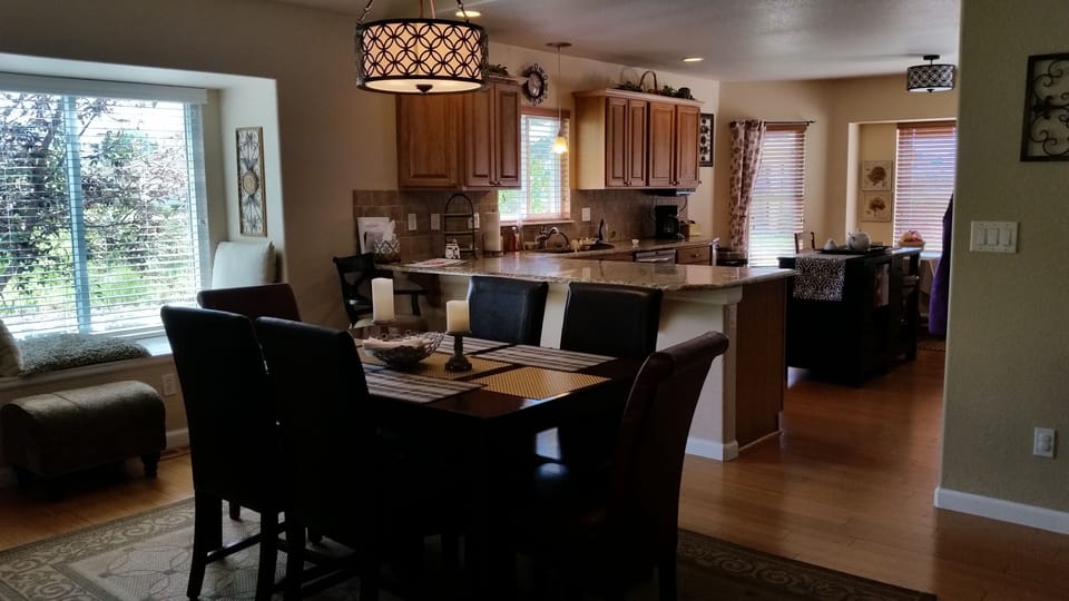 Window seat reading nook off dining area.