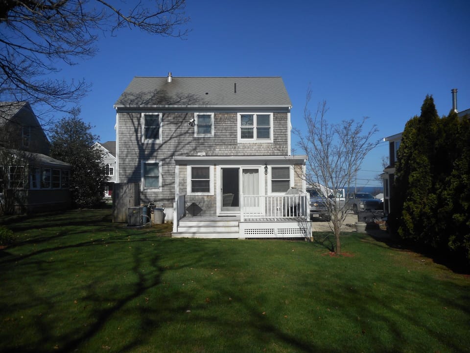 The back deck, yard and grill