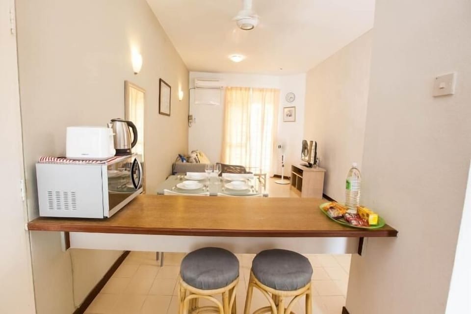 View of the living room from the kitchenette