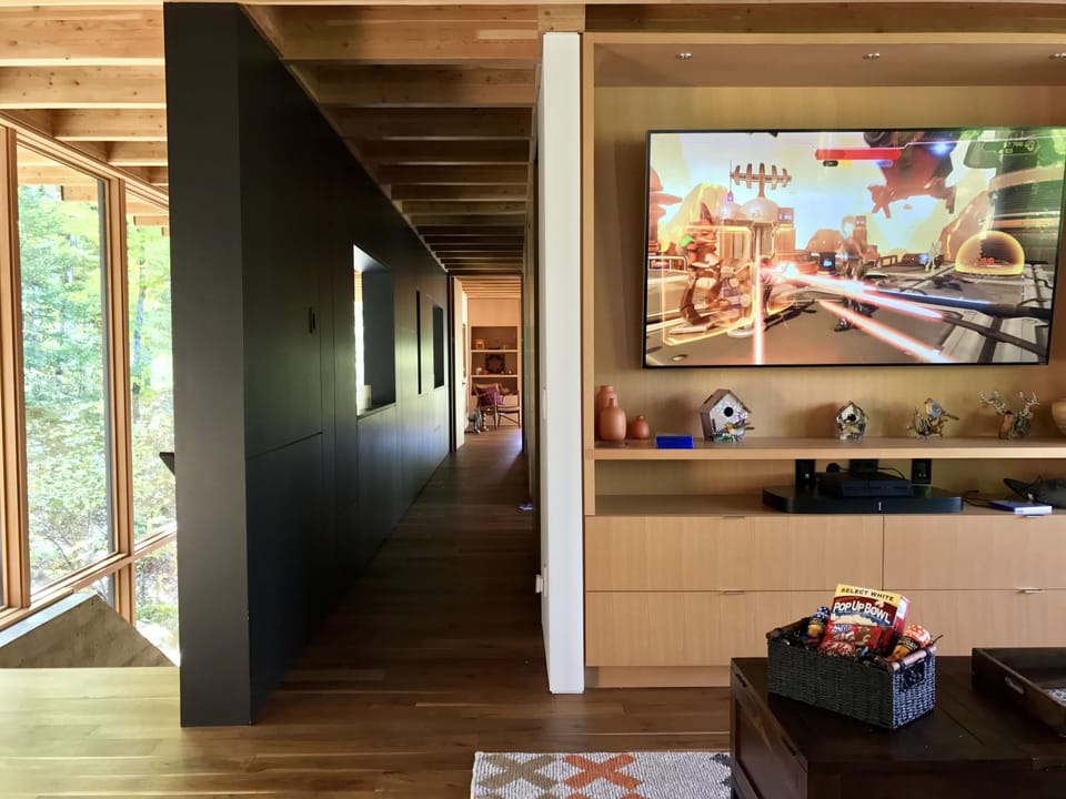 Big screen entertainment in the upper den: with PS4 and 100s of DVDs.
