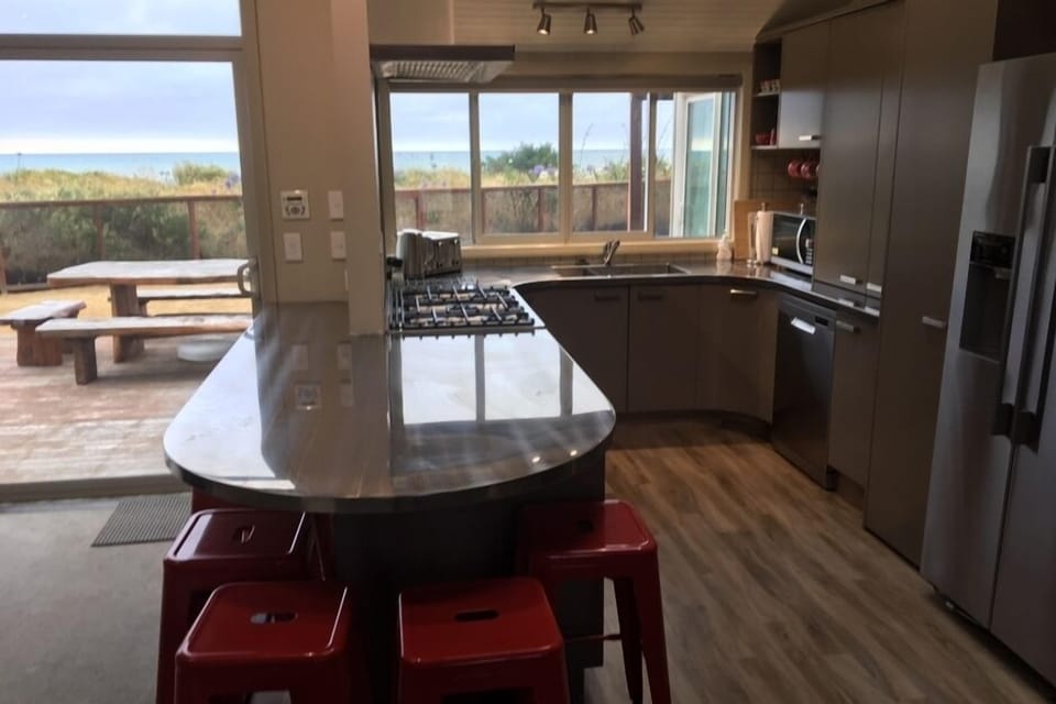 The kitchen: well equipped with big double sink, 5 burner stove, 2 big fridges.