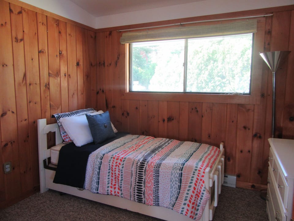 Twin bedroom on main level.  Bay views from window.