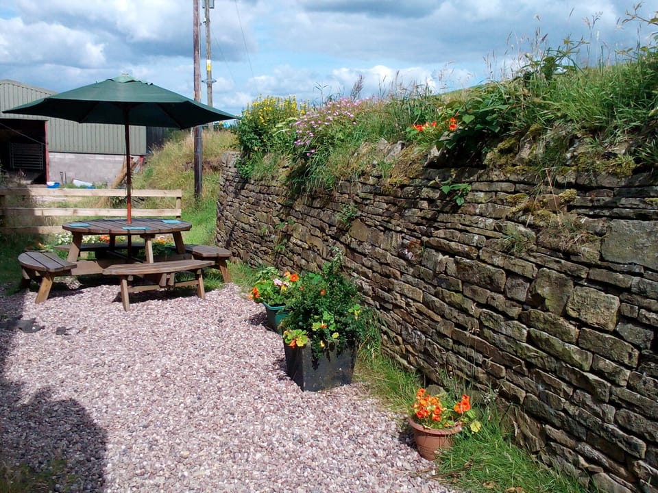 Outside area ideal for relaxing on lovely days.
