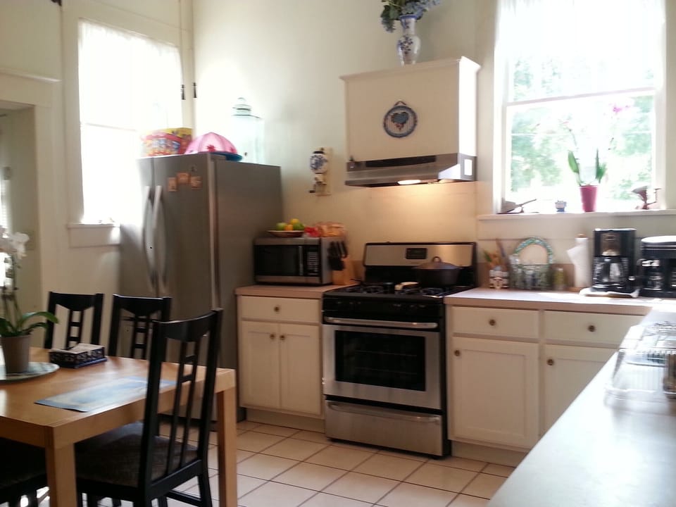 Partial view of large kitchen with new stainless appliances will be well stocked