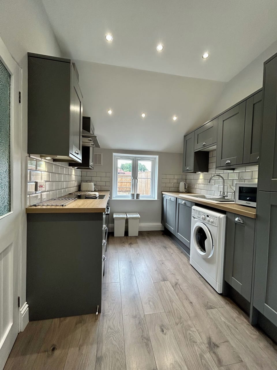 Kitchen - dishwasher, microwave, fridge freezer, washing machine, hob, oven