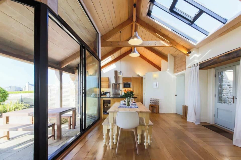 View from the lounge to the dining area and kitchen