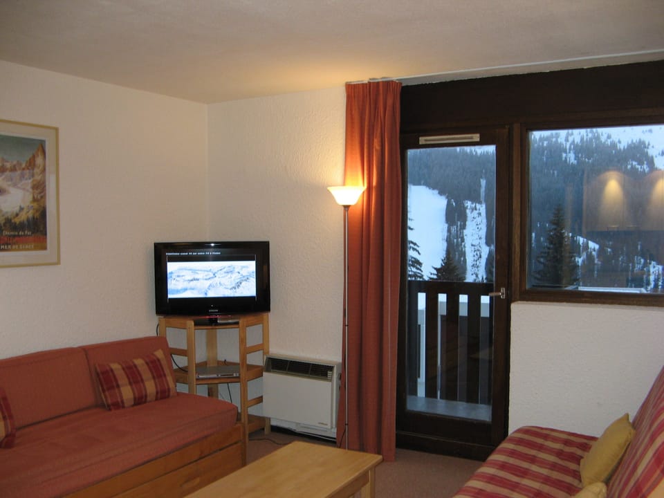 32 inch TV and single sofa bed