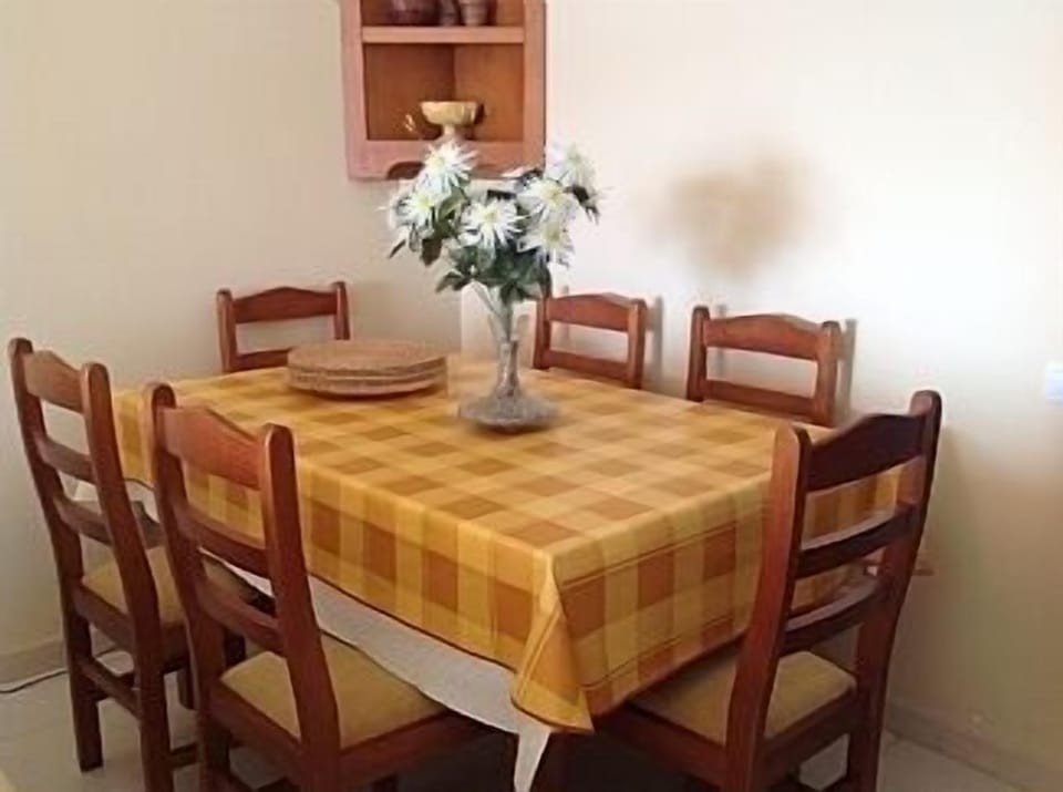 Dining area with table and chairs